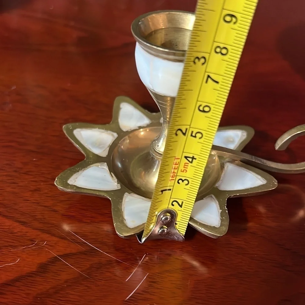 Brass candle holder.